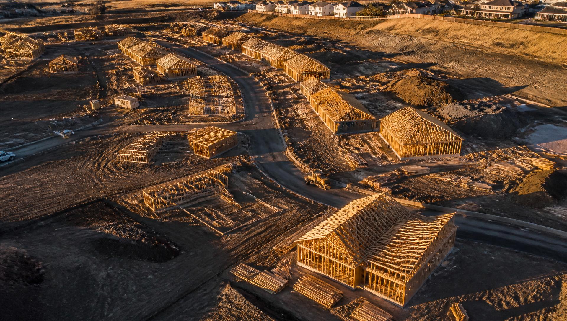 Aerial view of a residential construction subdivision at golden hour